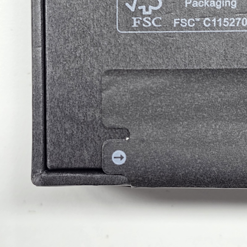 Samsung Smartphone (Unopened) — Bottom Seal - Left Side Close-up