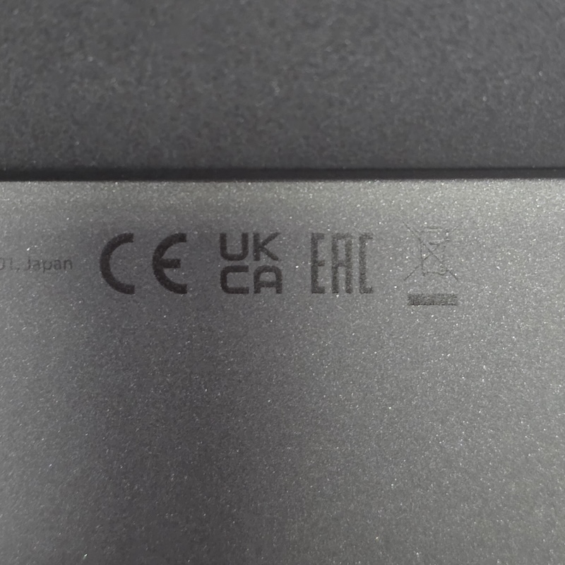 Nintendo Switch — Console Kickstand Inside - Certification Mark Close-up