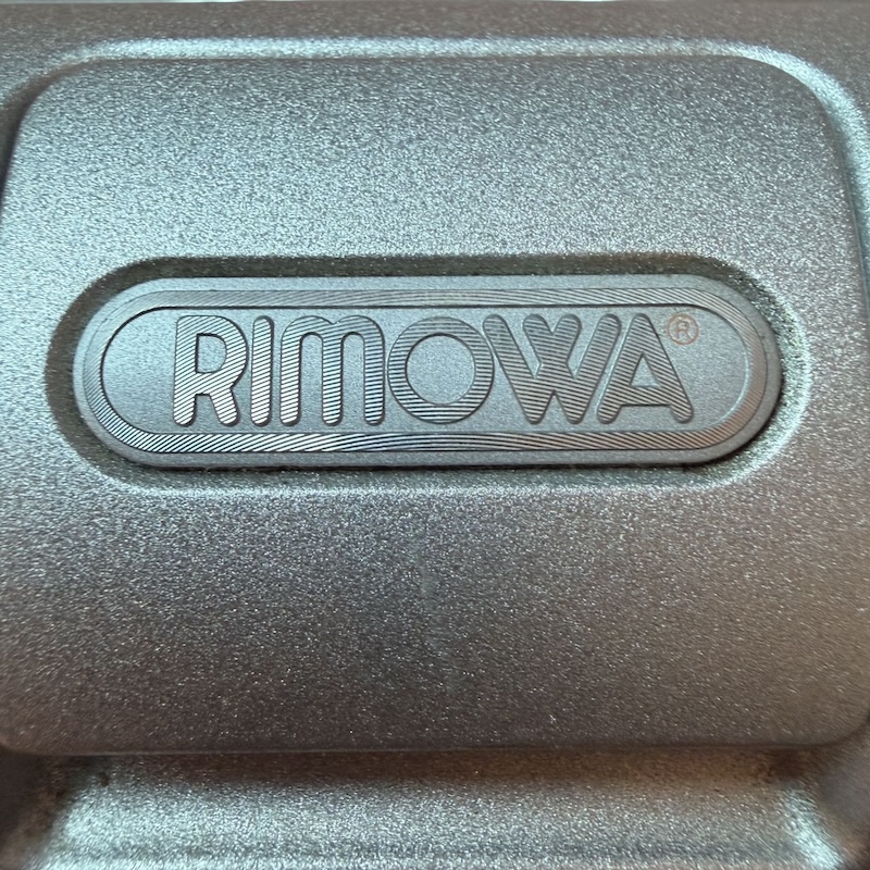 RIMOWA Suitcase — Brand Logo (2)