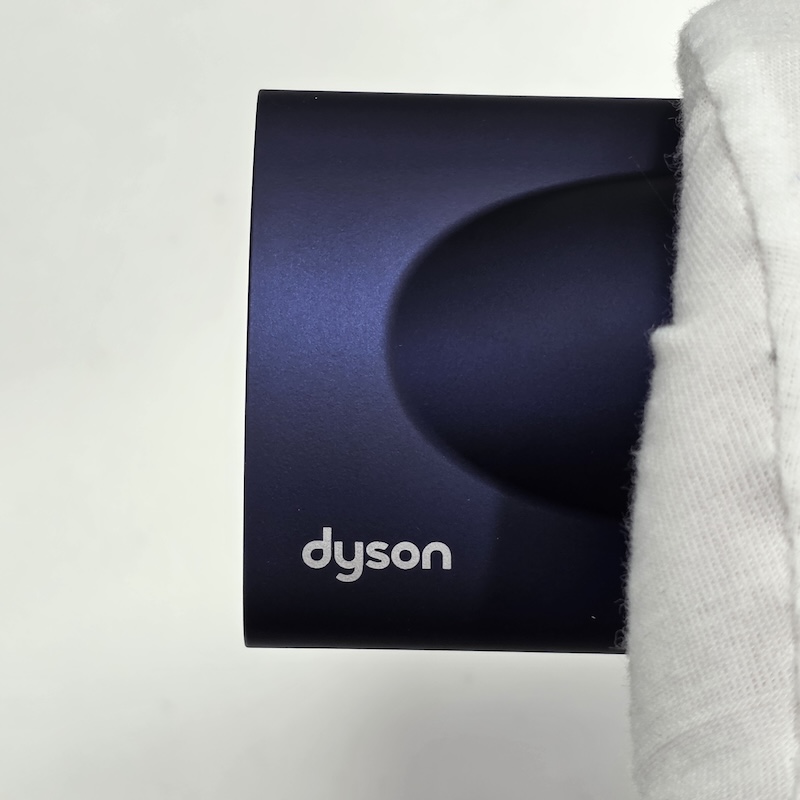 Dyson Curling Iron — Accessory - Brush Logo Detail