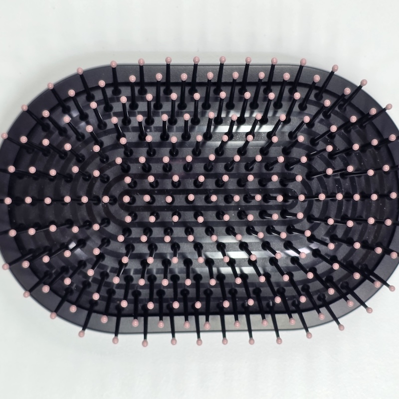 Dyson Cushion Comb — Front Detail