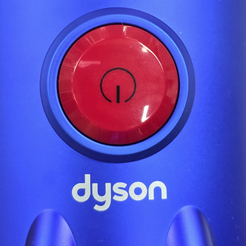 Dyson Vacuum Cleaner — Front Button Detail