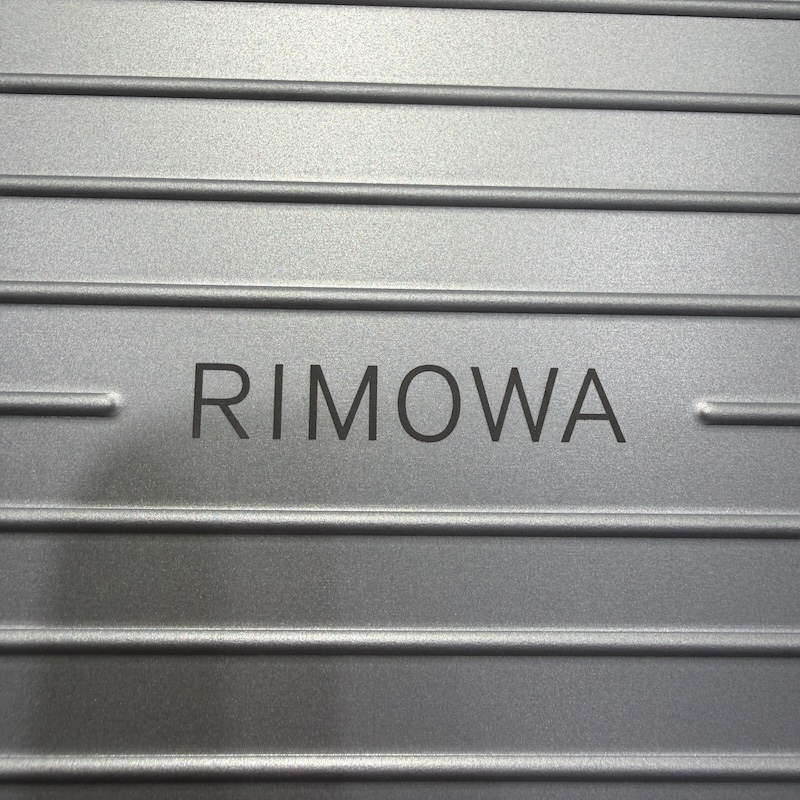 RIMOWA Handbags — Brand Logo